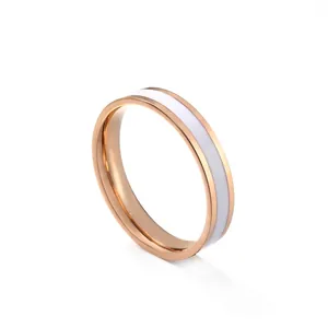 Minimalistischer Ring aus roségoldfarbenem Titanstahl mit weißem Emaille