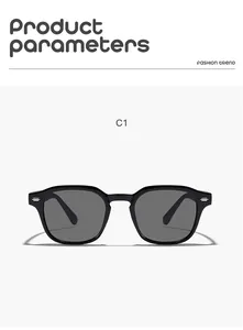 Gros plan de lunettes de soleil rétro carrées pour enfants noires à rivets