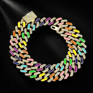 Detailed view of colorful enamel and iced-out diamond Cuban link pet necklace