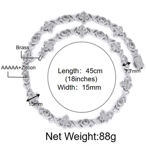 Detailed size view of hip hop silver necklace with iced-out cross and eye motifs.