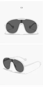 Vue détaillée de lunettes de soleil de sport surdimensionnées blanches pour enfants.
