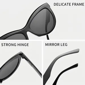 Lunettes de soleil œil-de-chat rétro avec détails du cadre, charnière et branches