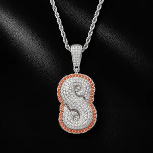 Iced-out bone letter S hip hop pendant necklace with orange and white cubic zirconia