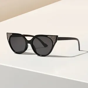 Gafas de sol de ojo de gato negras vintage con purpurina plateada elegante para mujer