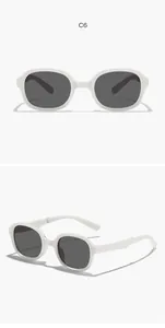 Detailed multi-angle view of white foldable children's sunglasses with dark lenses