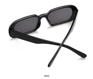 Vue arrière détaillée de lunettes de soleil rectangulaires rétro noires à branches larges