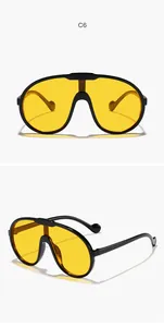 Lunettes de soleil bouclier pour enfants avec verres jaunes et monture de sport noire