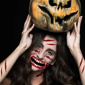Realistic Halloween horror face tattoos featuring scar and wound designs on model.