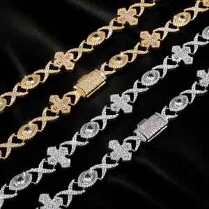 Detail view of hip-hop iced out cross and eye necklaces with sparkling zircon stones