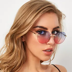 Occhiali da Sole Poligonali Senza Montatura Donna Moda Protezione UV400 Lenti Sfumate Stanghette in Metallo Stile Ins Trendy