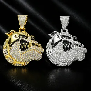 Close-up of hip-hop bulldog pendants in gold and silver with full rhinestones