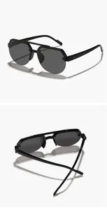 Detailed two-angle view of black children's aviator sunglasses with double-bridge design.