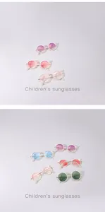 Detailed view of children's cat-ear sunglasses in multiple gradient color variations