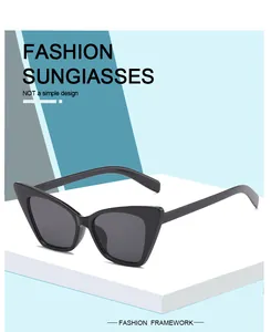 Detailed side perspective of vintage black cat-eye sunglasses with glossy finish