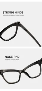 Detailed view of the durable hinge and ergonomic nose pads on black cat-eye glasses frames.
