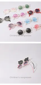 Detailed view of colorful cat-ear children's sunglasses with durable metal frames
