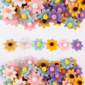 Colorful small felt daisy sunflower decorations for party bouquets and DIY crafts.