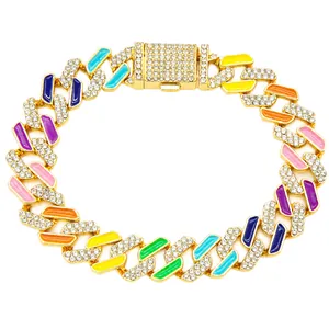 Vibrant rainbow cuban link pet necklace with iced out rhinestones and gold finish.