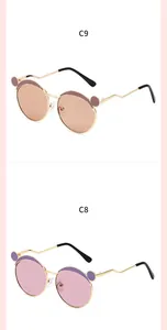 Detail of children's metal sunglasses with wavy temples and cute animal ear frames