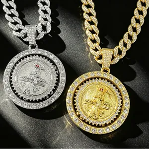 Close-up of iced out Grim Reaper spinning pendant necklace with Cuban chain details