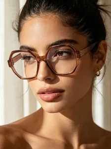 Close-up of stylish brown polygonal anti-blue light glasses on a fashion model