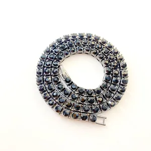 Close-up view of a luxury 5mm black rhinestone single-row tennis chain in hip-hop style