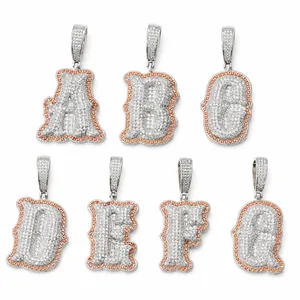 Iced out hip hop alphabet pendants A-G with orange border in copper and cubic zirconia