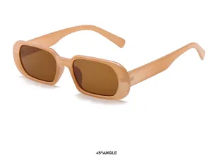 Détail macro de lunettes de soleil rectangulaires rétro avec verres teintés marron