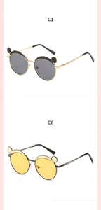 Adorable kids' metal frame sunglasses with bear ear decoration in grey and yellow