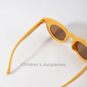 Gelbe runde Kinder-Sonnenbrille mit braunen UV-Schutz-Gläsern für Jungen und Mädchen