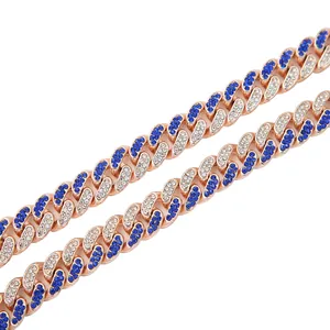 Macro view of a 13mm hip hop style two-tone blue and white iced-out Cuban link chain
