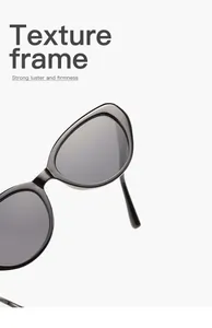 Dettaglio ravvicinato di occhiali da sole vintage cat-eye con montatura nera lucida