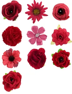 Detailed view of various red silk flower heads for DIY handmade crafts and wedding decor.