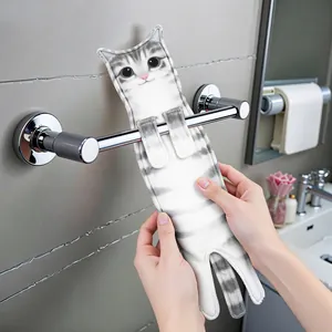 Detailed view of a cute realistic cat-shaped hanging hand towel on a bathroom rack.