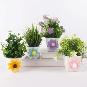 Detailed view of artificial potted plants with colorful felt sunflower decorations