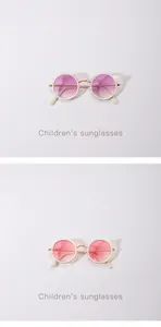 Detailed view of children's cat-ear sunglasses with pink and red gradient lenses