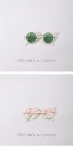 Detail of children's metal sunglasses with cute cat ear design and multi-color lenses.