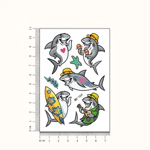 Detailed view of children's shark temporary tattoo sheet showing various patterns
