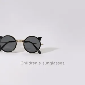 Stylish metal children's sunglasses featuring cute cat ear frames and protective dark lenses