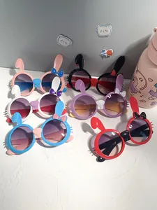 Group of colorful cute rabbit-shaped cartoon sunglasses for children's outdoor fashion.