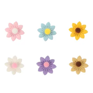 Set of six colorful plush fabric daisy flowers for DIY wedding and party decorations