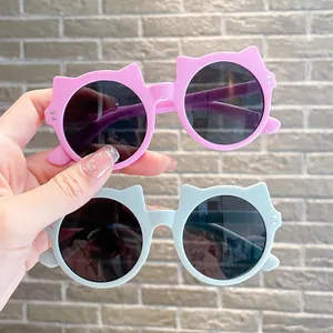 Cute cat-eared children's sunglasses with UV400 protection in pink and light blue colors