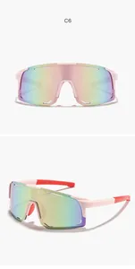 Detailed close-up of kids' sport cycling sunglasses featuring pink frames and rainbow lens