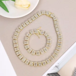 Iced out gold square link necklace and bracelet set with sparkling stones detail
