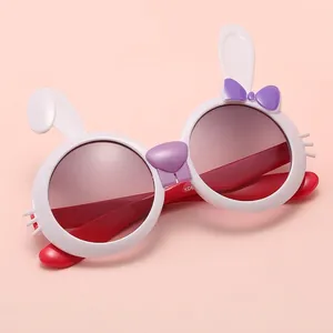 Cute bunny-shaped kids sunglasses with UV protection in a stylish white and red frame.