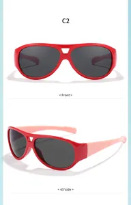 Detailansicht der roten Kinder-Aviator-Sonnenbrille mit rosa Bügeln und dunklen Gläsern.