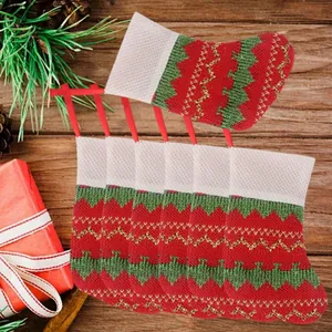 Set of mini knitted Christmas stockings for festive tree decorations and gifts