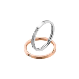 Minimalistische titaniumstalen koppelringen met enkele diamant in zilver en roségoud