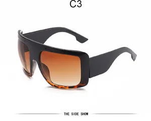 Side view of fashion oversized retro mask sunglasses with gradient brown lenses