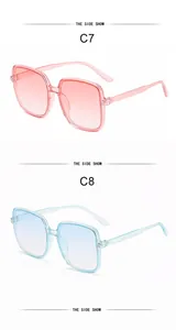 Side view of oversized square sunglasses in pink and blue gradient lenses